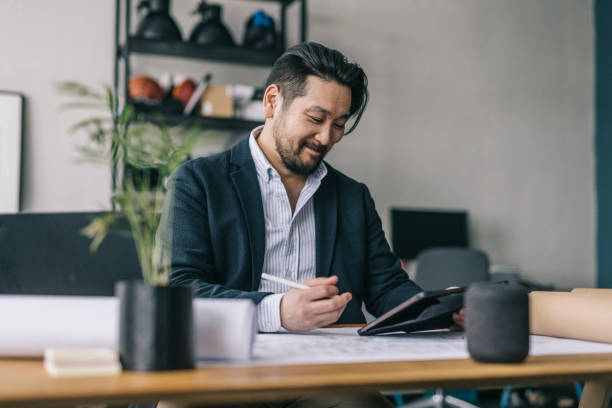 Japanese entrepreneur working at the office