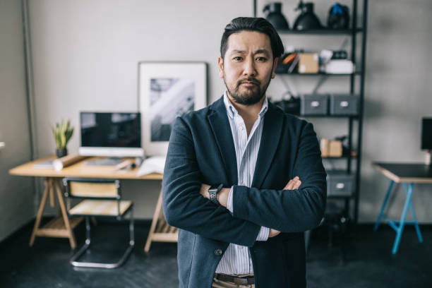 istock Confident male entrepreneur in his office 1301788834