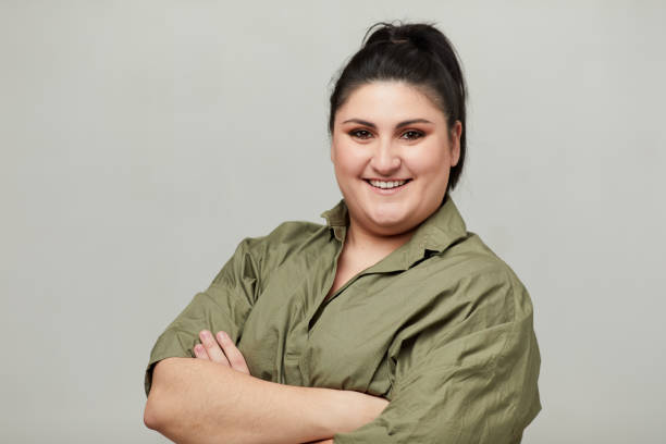istock Plus size woman formal portrait. 1301789574