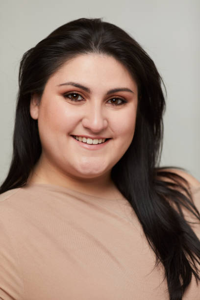 istock A woman formal portrait looking at the camera. 1301790117