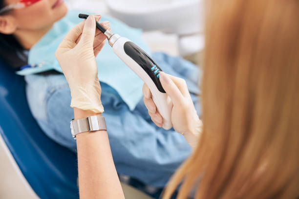 istock Focused photo on female hands holding dentistry gadget 1301795633