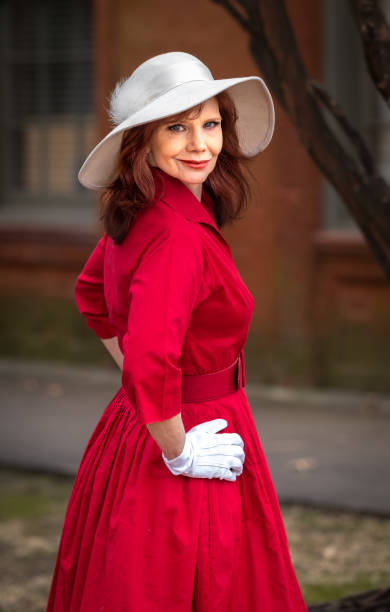 istock Woman in Red Dress 1301795903