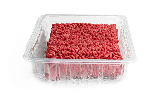 Raw minced  beef in plastic pack isolated on white