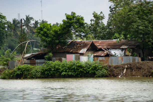istock Poor house nearby the river side 1301798180