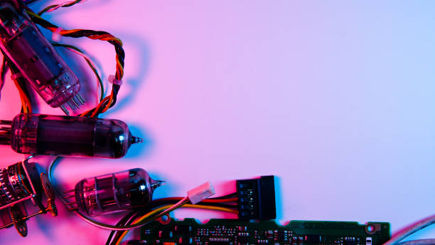 istock wires, electrical circuits, and electric boards . red and blue illumination, cyberpunk. 1301798826