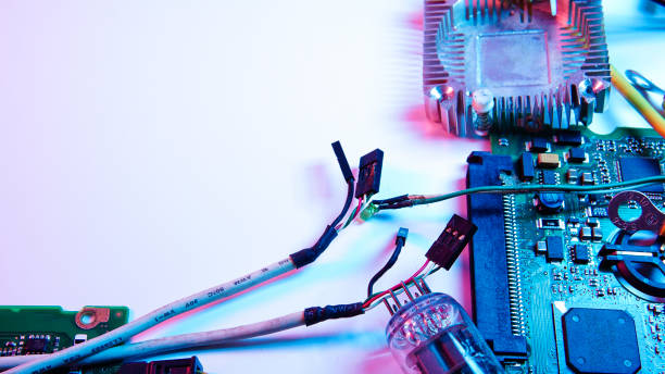 istock wires, electrical circuits, and electric boards . red and blue illumination, cyberpunk. 1301798834