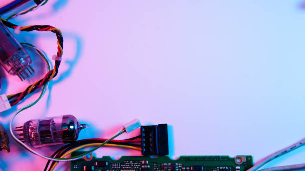 istock wires, electrical circuits, and electric boards . red and blue illumination, cyberpunk. 1301798869