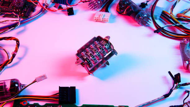 istock wires, electrical circuits, and electric boards . red and blue illumination, cyberpunk. 1301798896