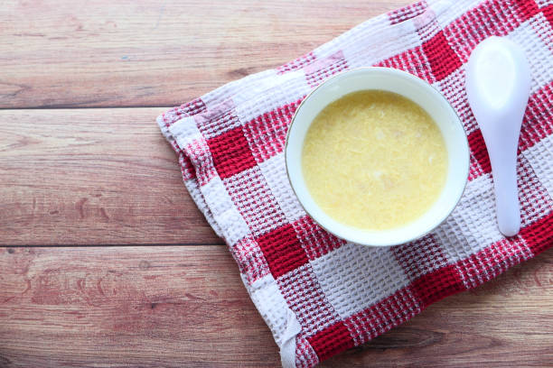 istock Thai hot spicy soup in bowl on table 1301799756