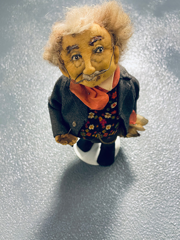 Confused vintage professor puppet