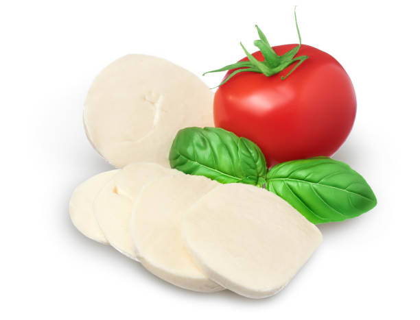 istock Mozzarella cheese sliced with basil leaf and tomato isolated on white background with clipping path and full depth of field 1301803810