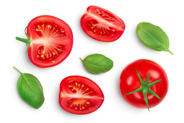 istock Tomato slices with basil leaf isolated on white background. Clipping path. Top view with copy space for your text. Flat lay 1301805068