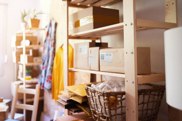 istock Close up of shelf with cardboard boxes ready for shipping 1301806934