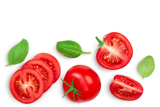istock Tomato slices with basil isolated on white background. Clipping path. Top view with copy space for your text. Flat lay 1301808820