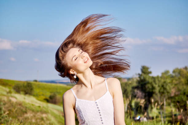 istock girl in the field 1301809677