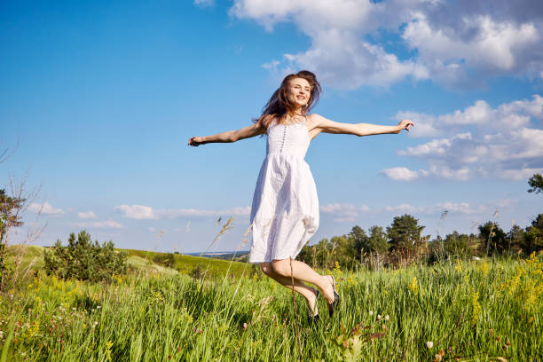 istock girl in the field 1301809838