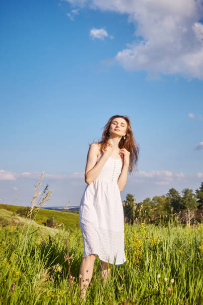istock girl in the field 1301810690