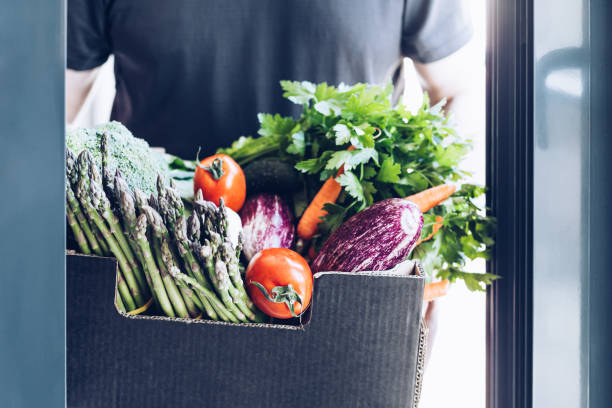 istock Fresh organic greens and vegetables delivery 1301813892
