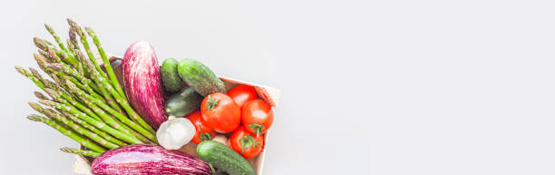 istock Fresh organic vegetables in wooden box 1301813954