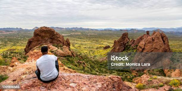 African American Man Looking At Arizona Desert From Flatiron Peak Panorama Stock Photo - Download Image Now