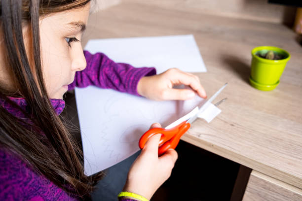 istock Girl child designing handcrafted things at home 1301817343
