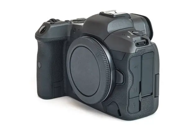 Modern mirrorless full-frame high resolution digital camera (photo 45 Mpix/video 8k), isolated on white.
