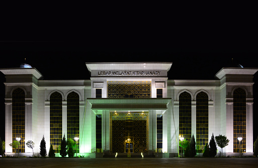 Turkmenabat, Lebap Region, Turkmenistan: facade of the Lebap Provincial Library at night - Bitarap Turkmenistan Avenue - Lebap Welaýat Kitaphanasy.