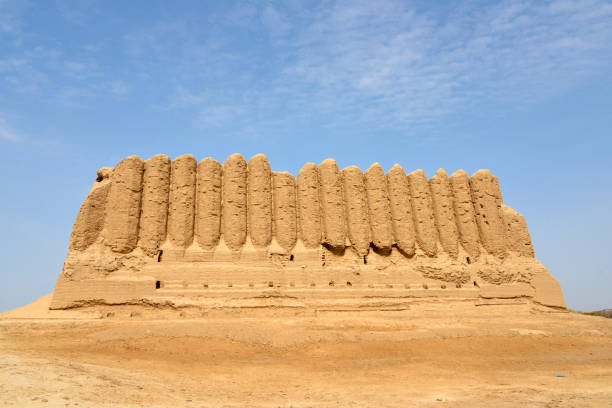Merv, Mary Region, Turkmenistan:  Greater 'Kyz Kala', 'Maiden's Castle' - probably a fortified residence - unfired mud brick sloping corrugated walls rising 12 meters above the platform, one of the largest surviving monumental koshk (earthen building) in Central Asia - 7th-12th centuries - aka Gyz Gala - ruins of ancient Merv - UNESCO World Heritage Site, State Historical and Cultural Park.