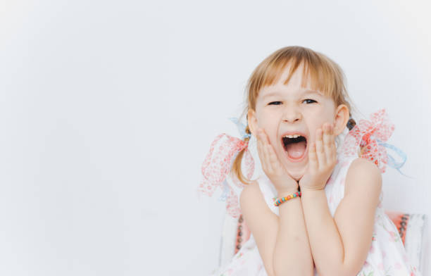istock Little girl on a white background. 1301828392