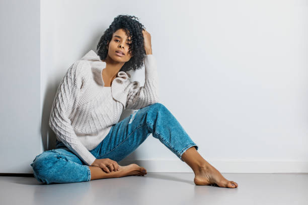 istock Beautiful black female posing for studio portrait 1301832192