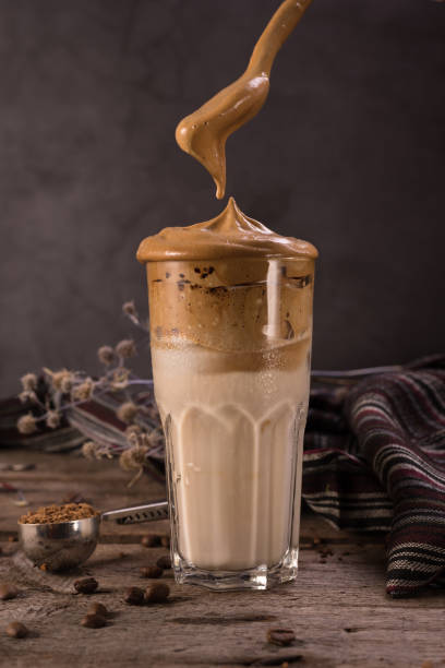 istock Dalgona Coffee. Whipped icing drink with instant coffee popular in Korea Creamy cocktail in tall Glasses. 1301832242