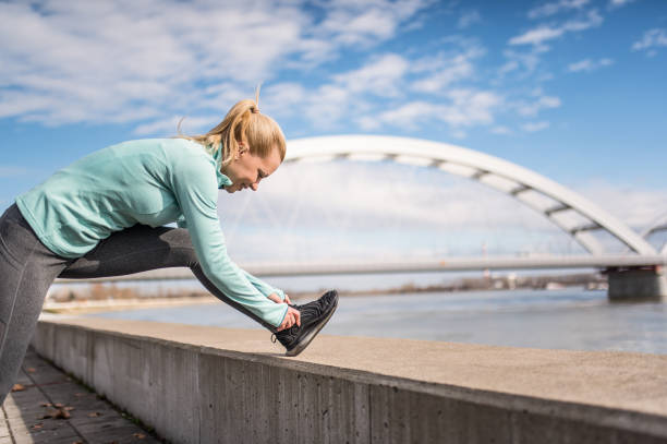 istock Young woman preparing for running. 1301835741