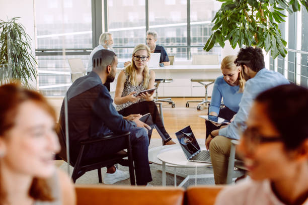 istock Business people having a meeting 1301841275
