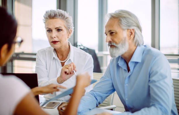 istock Business people having a meeting 1301842387