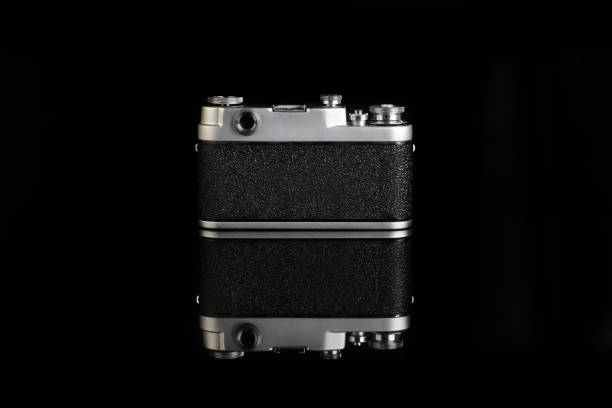 istock The very rare old rangefinder film camera on black background. 1301843277