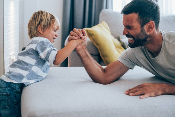 istock Father and little son at home. 1301844620