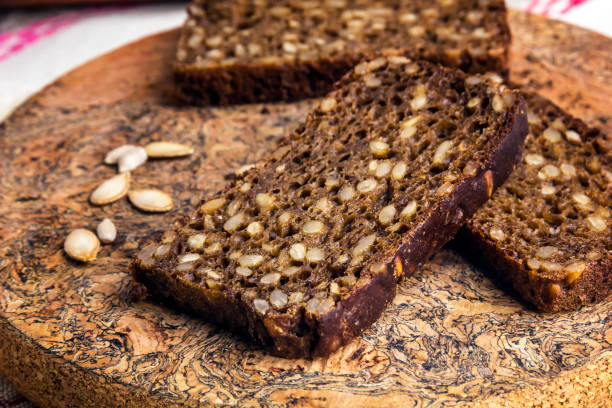 istock Sliced rye bread baked with sunflower seeds. 1301846744