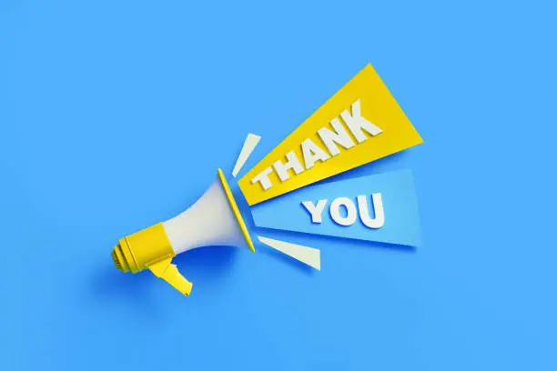 Photo of Thank You Coming Out From Yellow Megaphone On Blue Background - Gratitude Concept
