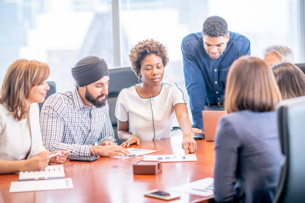 istock Diverse group of businesspeople collaborating 1301856269
