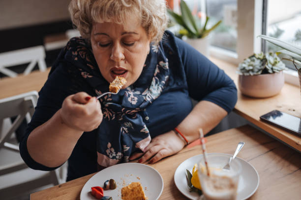 istock Enjoying sweet dessert in a coffee shop 1301857287