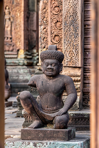 Banteay Srei, Cambodia - January 24, 2020: Banteay Srei is a 10th-century Cambodian temple dedicated to the Hindu god Shiva. It is built largely of red sandstone that can be carved like wood and millions of visitors admire the intricate reliefs carved in red colored sandstone.