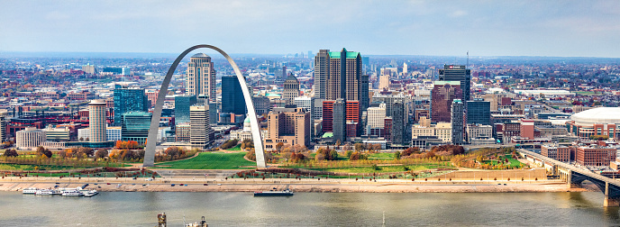 The skyline of the city of St. Louis, Missouri on the banks of the Mississippi River.