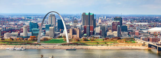 Skyline of St. Louis The skyline of the city of St. Louis, Missouri on the banks of the Mississippi River. mississippi river stock pictures, royalty-free photos & images