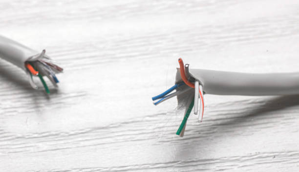 istock close up photo - broken ethernet link twisted pair cable 1301863312