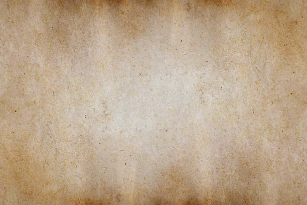 istock Old brown paper grunge background. 1301865485