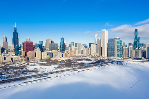 Aerial View of a frozen Chicago River and cityscape
