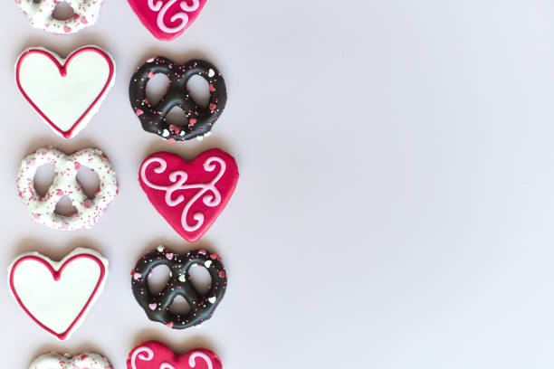 istock Baked Valentine's Day Treats Background w/ Copy Space 1301878941