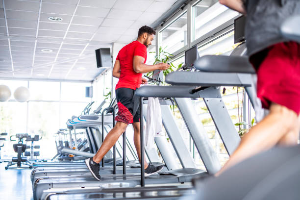 istock African Mid Adult Man Working Out on Treadmill 1301879212