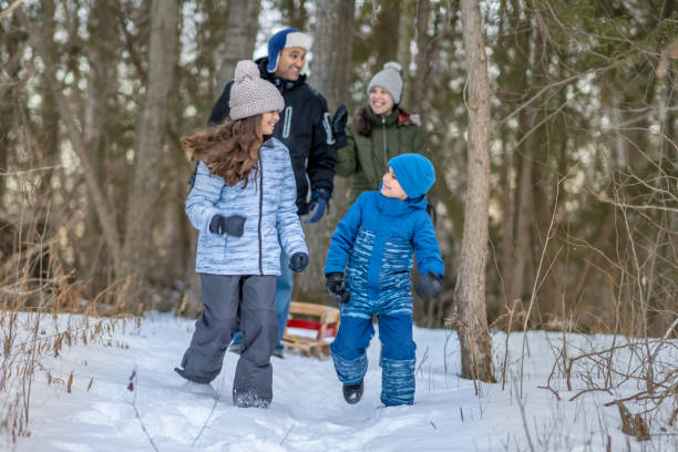 istock Family walking in forest 1301881703
