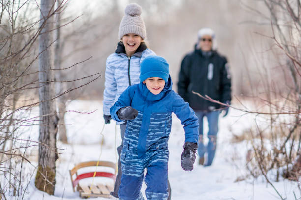 istock Family walking in forest 1301881734